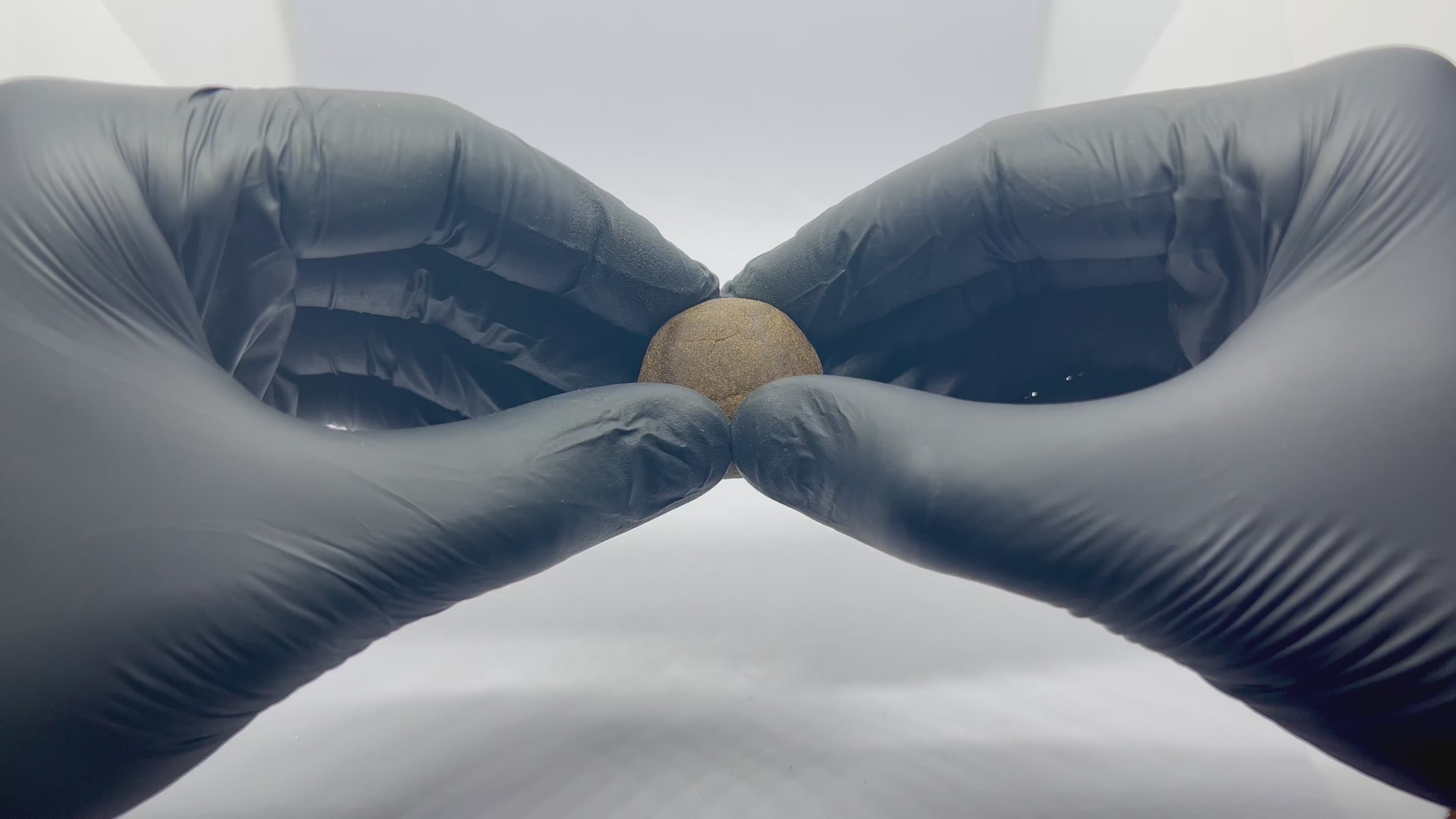 3X CBD 5g hash ball opening up 